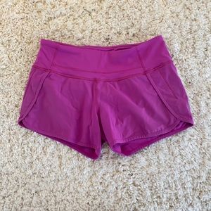 Pink lululemon shorts.